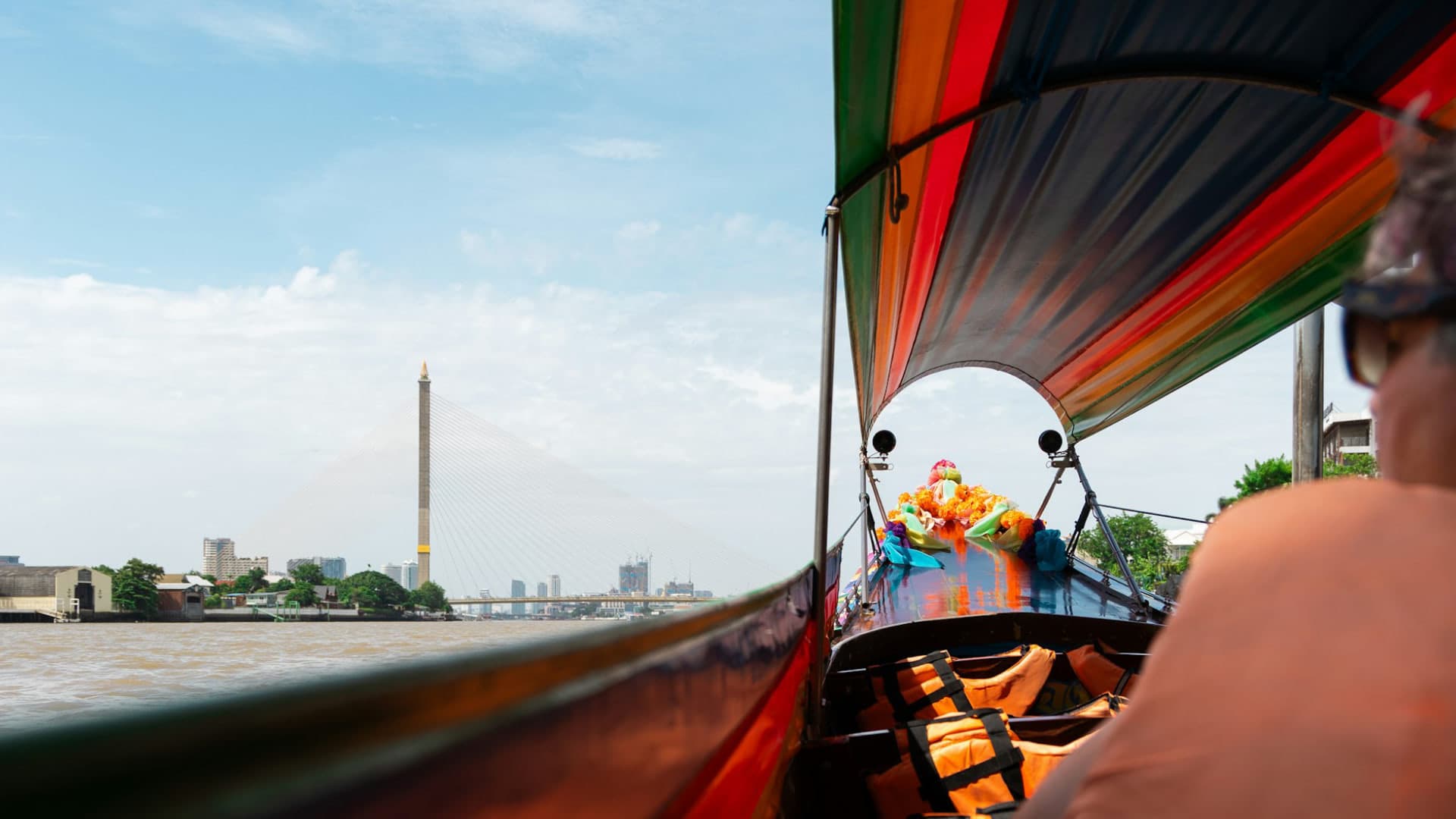 The bow of a long-tail boat heading up the Chao Phraya